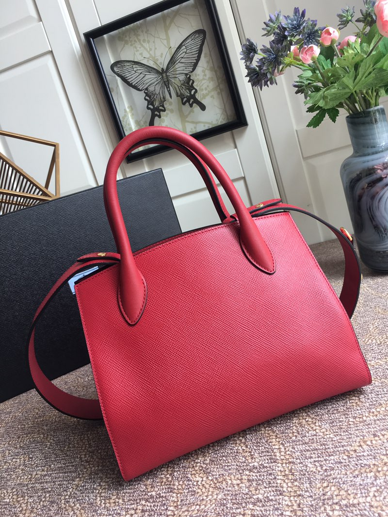 Pra*a top handle bags